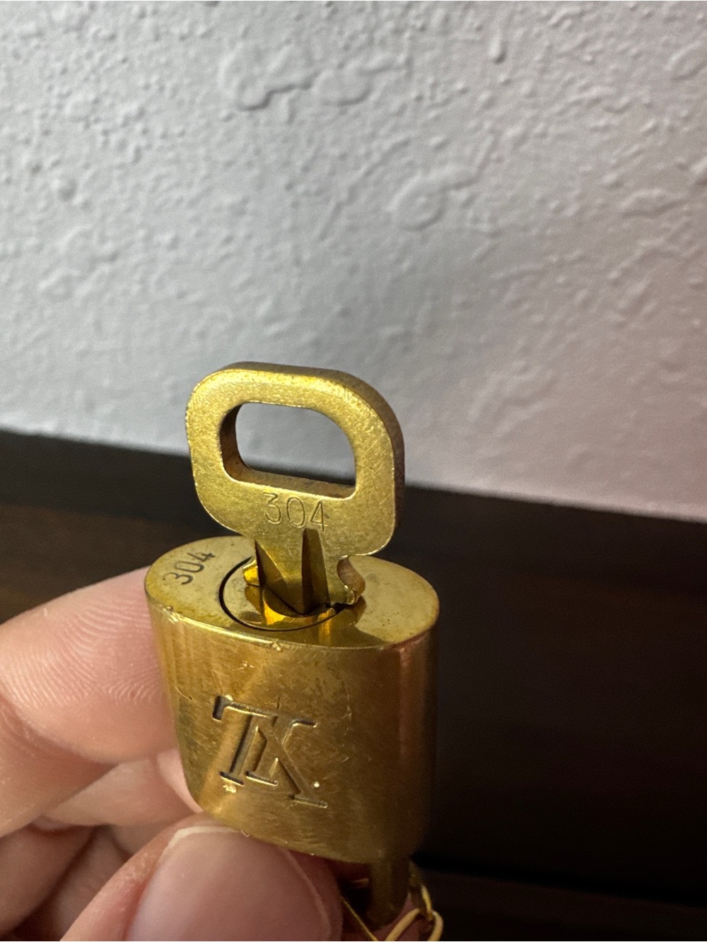 Louis Vuitton Gold lock and key model 304